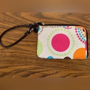 Wristlet Zip around funky color pop from thirty one.​​​​​​​​​​​​​​​​